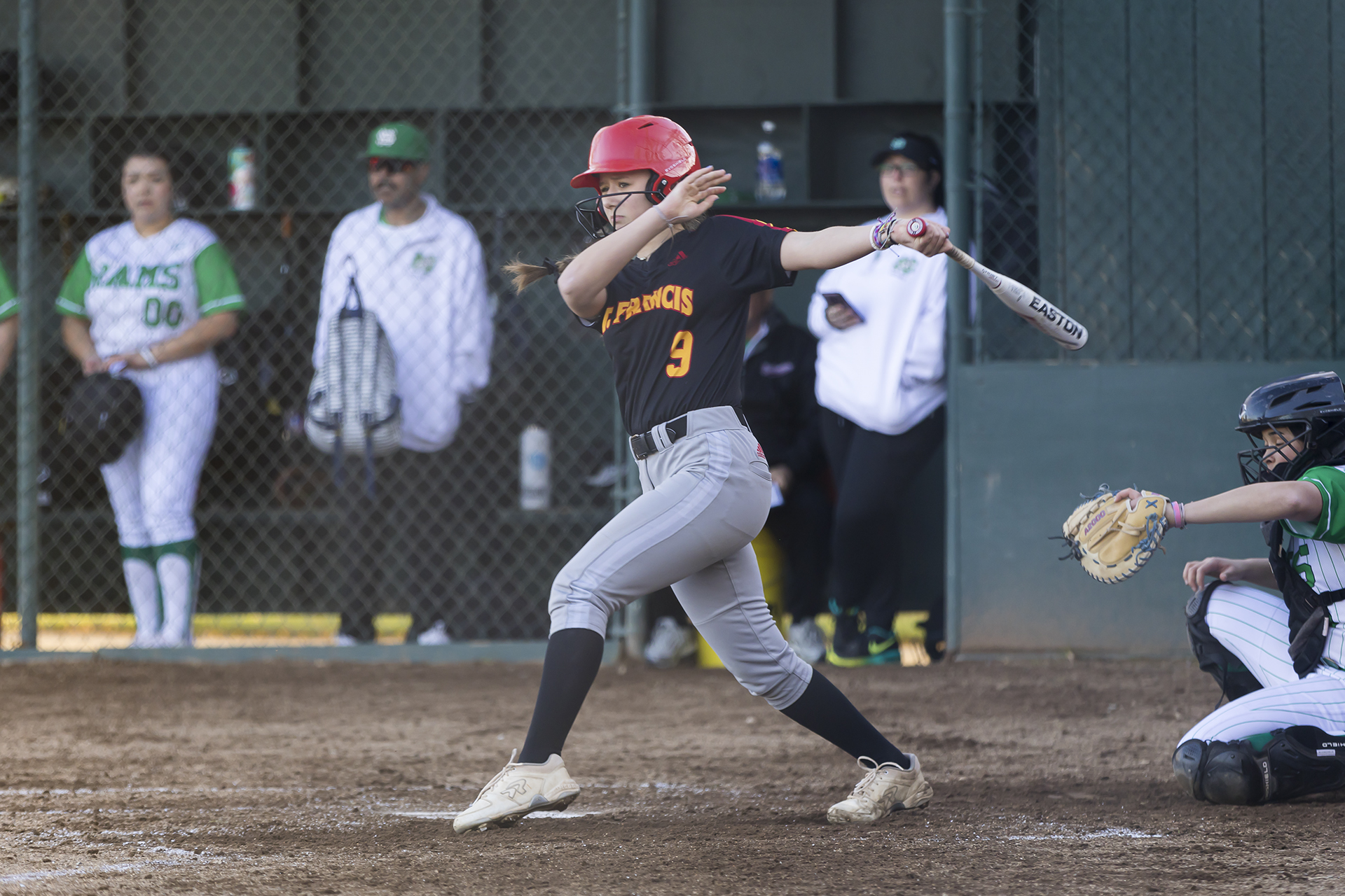 Rams turn back Troubies in softball opener