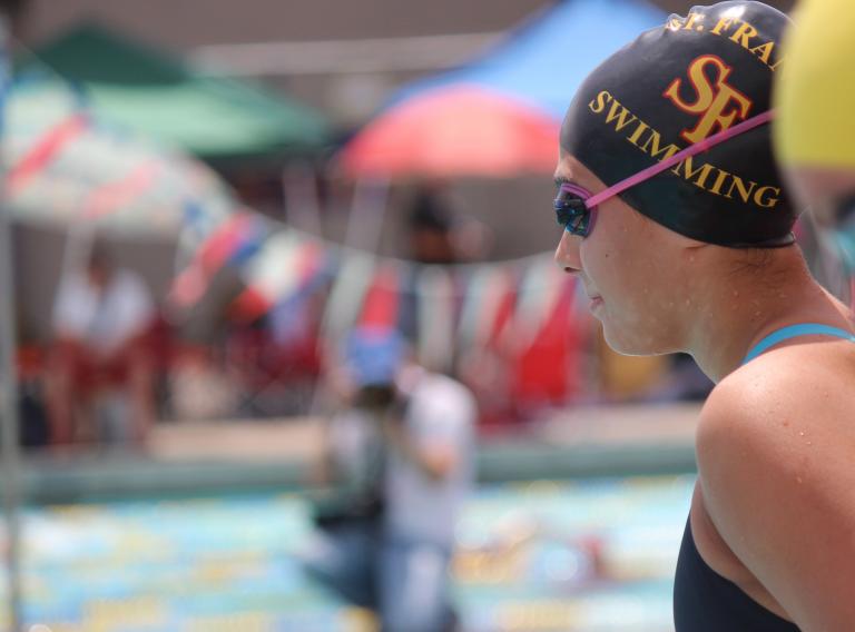 Swimmer Mitchell Coordinates Successful Caps for Cancer