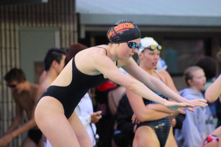 Swimming Defeated by Davis in Dual Meet