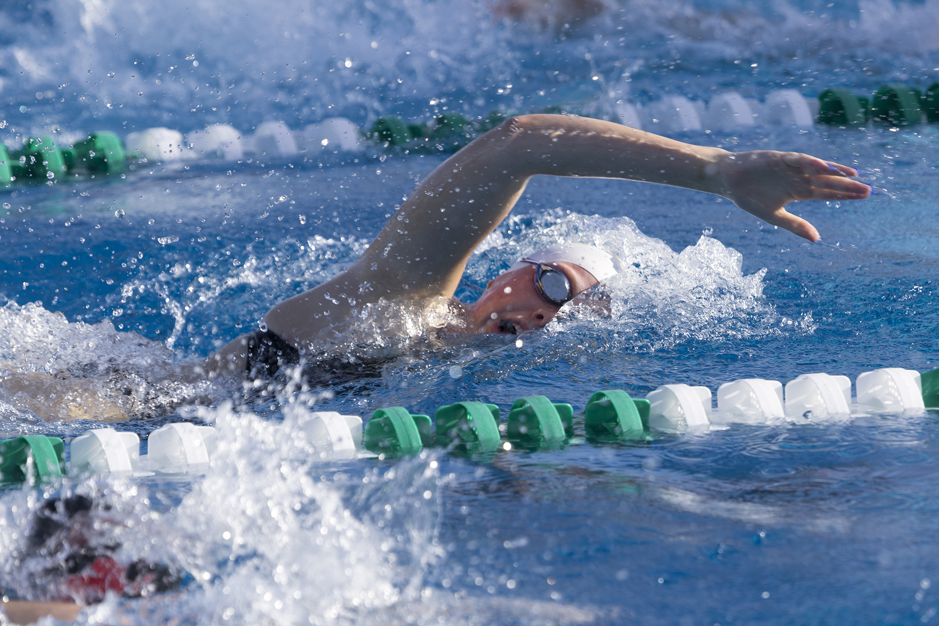Troubie swim dominates Delta double dual