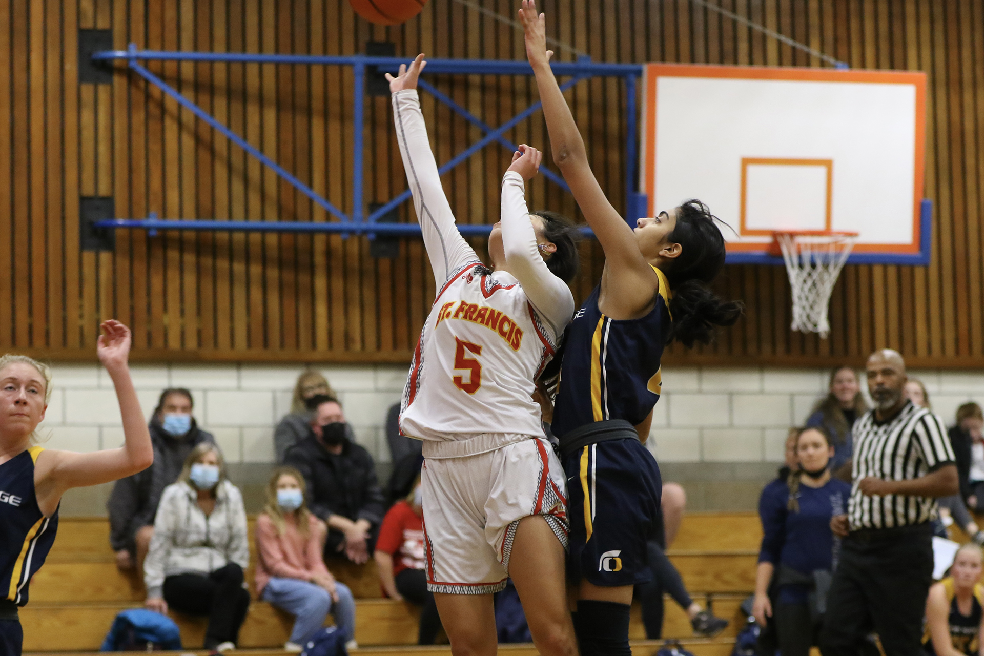 Trojans rally late to edge JV Gold