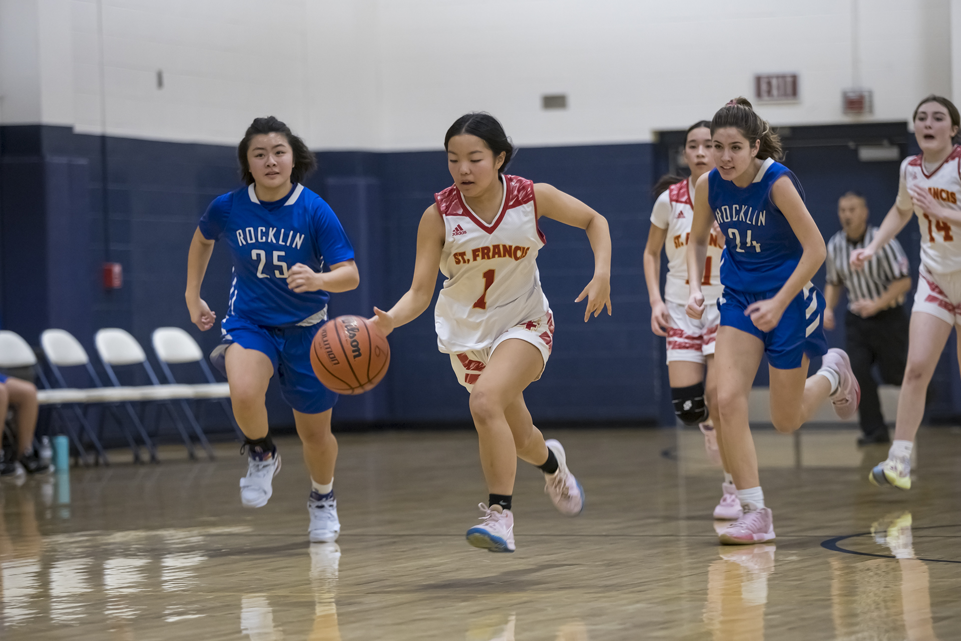 Varsity, JV Gold advance at Trojan Toss-Up