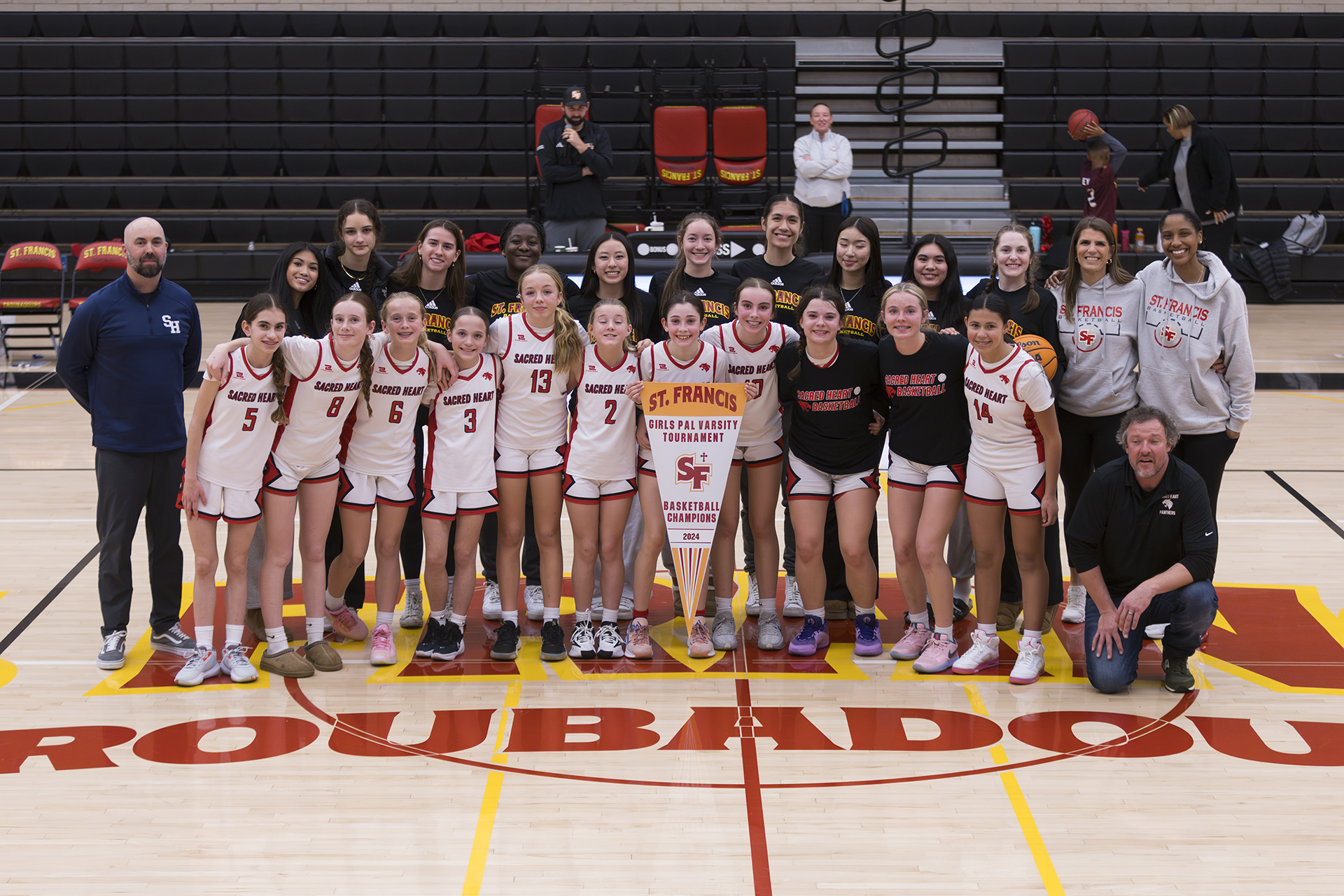 Sacred Heart holds off SI to win PAL hoop tourney