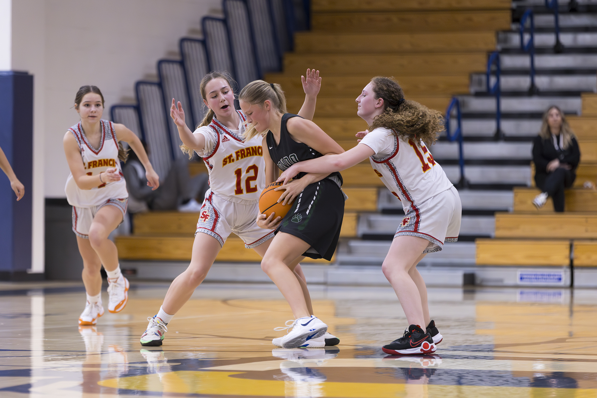 JV Red falls to Pondo in Trojan Toss-up opener