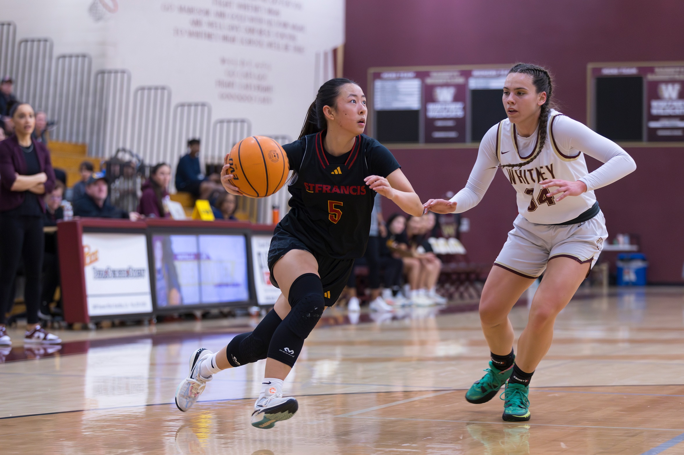 Teoh scores 1,000th career point at Whitney