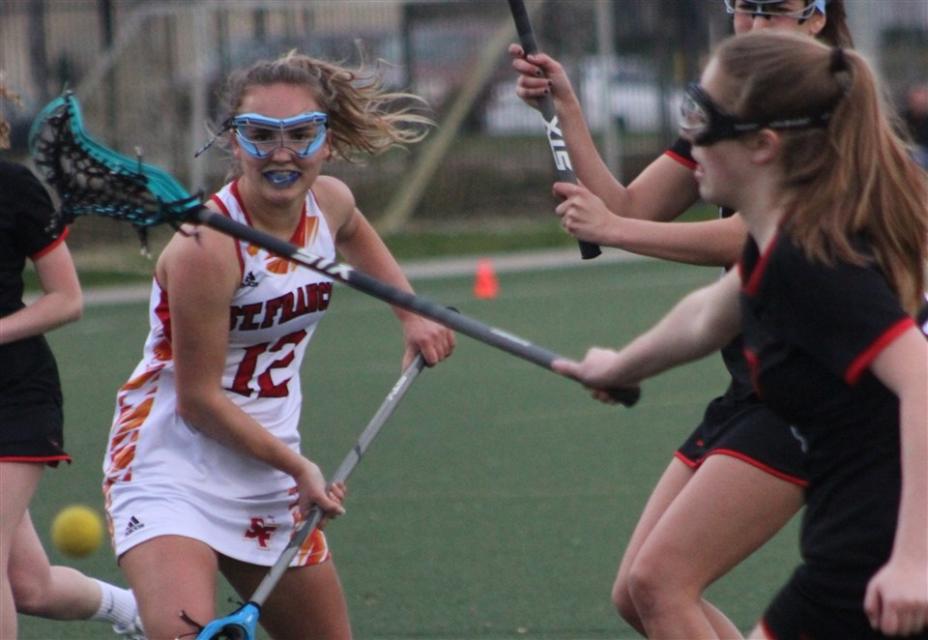 Lacrosse Defeats Gunn 8-7