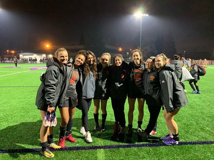 Alumna Janae DeFazio (UCLA) was a spectator at the game vs. Sheldon. She is pictured here with a group of seniors.