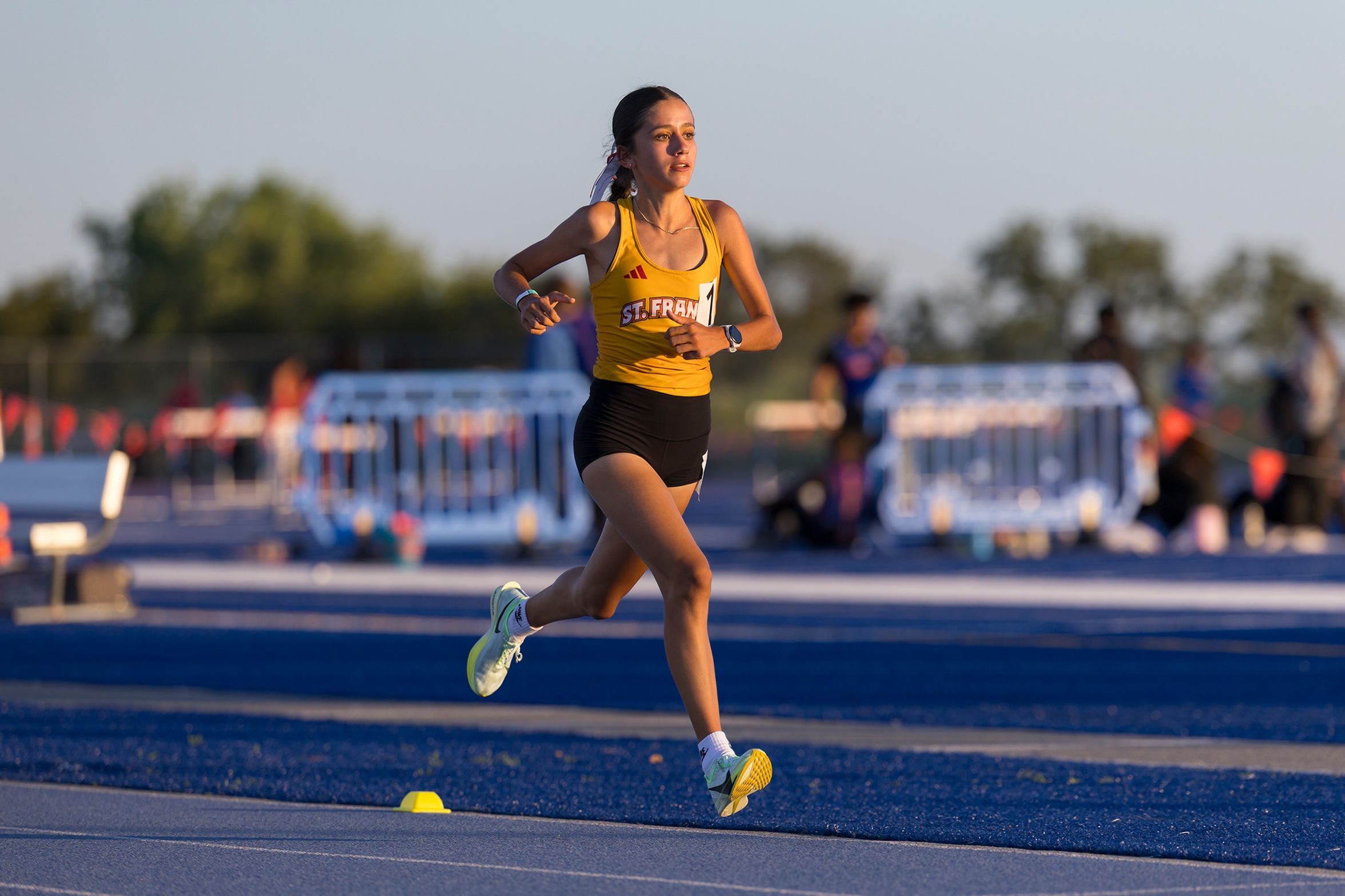 Gutierrez sets two SF records, qualifies for state meet