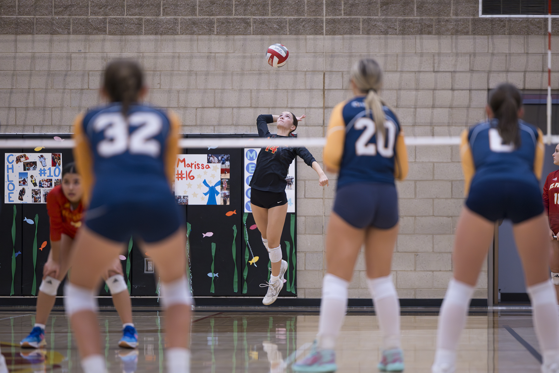 JV overcomes slow start to sweep Trojans